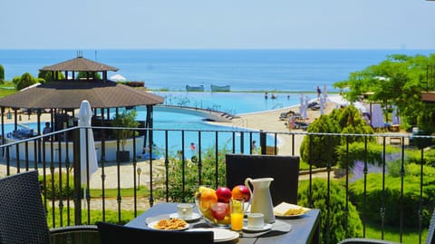 Day, View (from property/room), Pool view, Sea view, Swimming pool