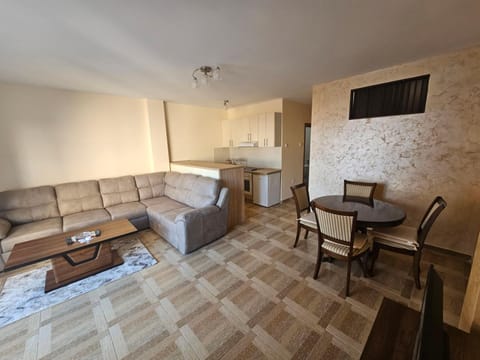 Bed, TV and multimedia, Living room, Seating area, Dining area