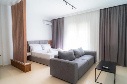 Bed, Living room, Photo of the whole room, Seating area, Bedroom