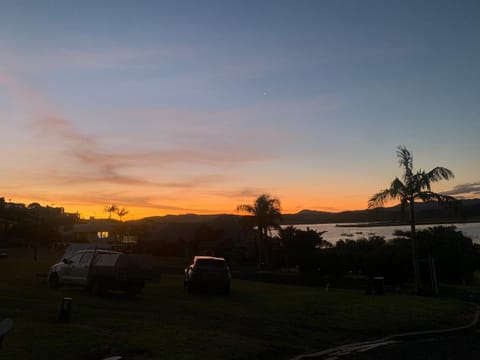 Property building, Natural landscape, Sunset, Parking