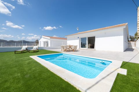 Property building, Patio, Swimming pool, sunbed