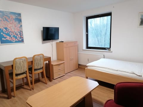 Bed, Seating area, Evening entertainment