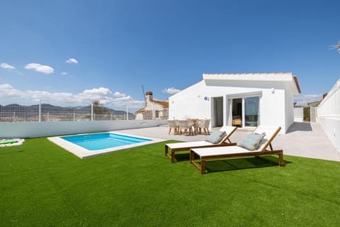 Property building, Patio, Swimming pool, sunbed