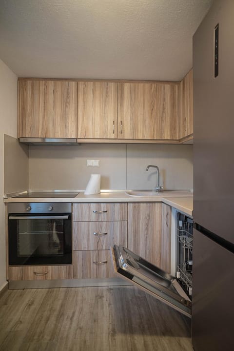 Kitchen or kitchenette, stove