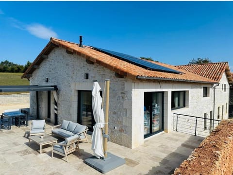 Property building, Patio, Natural landscape, Dining area