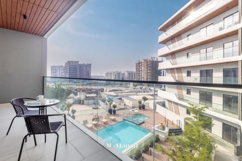 Property building, Patio, Day, View (from property/room), Balcony/Terrace, City view, Pool view, Swimming pool, sunbed