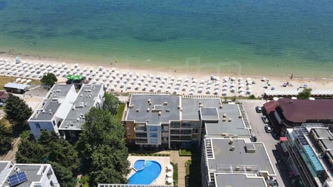 Property building, Beach, Pool view, Swimming pool