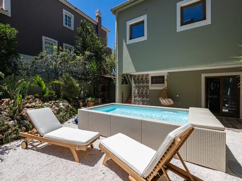 Swimming pool, sunbed