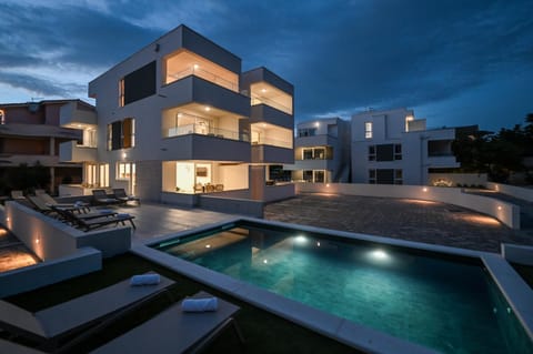 Property building, Night, Pool view, Swimming pool