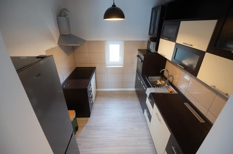 Kitchen or kitchenette, oven