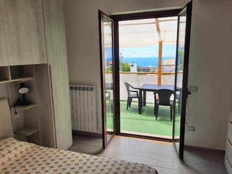 Bed, Natural landscape, View (from property/room), Balcony/Terrace, Dining area, Bedroom, Sea view