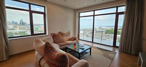 View (from property/room), Balcony/Terrace, Living room, Seating area, Sea view