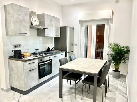 Kitchen or kitchenette, Dining area, oven, stove, toaster