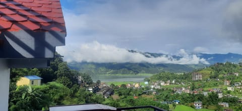 Property building, Nearby landmark, Spring, Day, Natural landscape, Mountain view