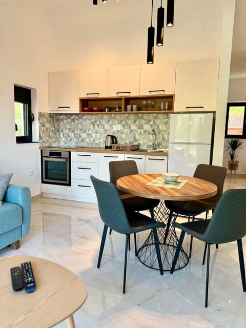 Living room, Seating area, Dining area, dishwasher, oven, stove, kitchen