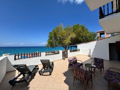 Patio, Day, Natural landscape, Balcony/Terrace, Beach, Sea view, sunbed