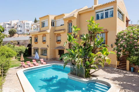 Property building, Living room, Swimming pool