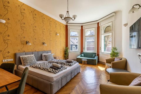 Bed, Living room, Seating area, Bedroom