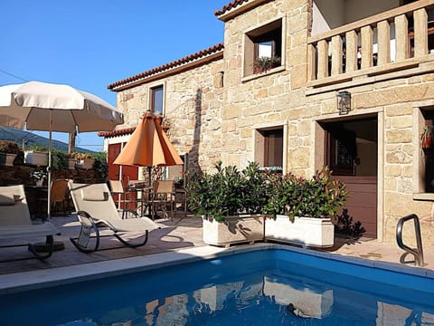 Property building, Patio, Day, Pool view, Swimming pool, sunbed