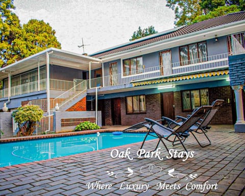 Property building, Patio, Day, Pool view, Swimming pool, sunbed