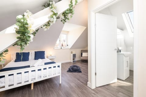 Bed, Bathroom, Seating area, Bedroom