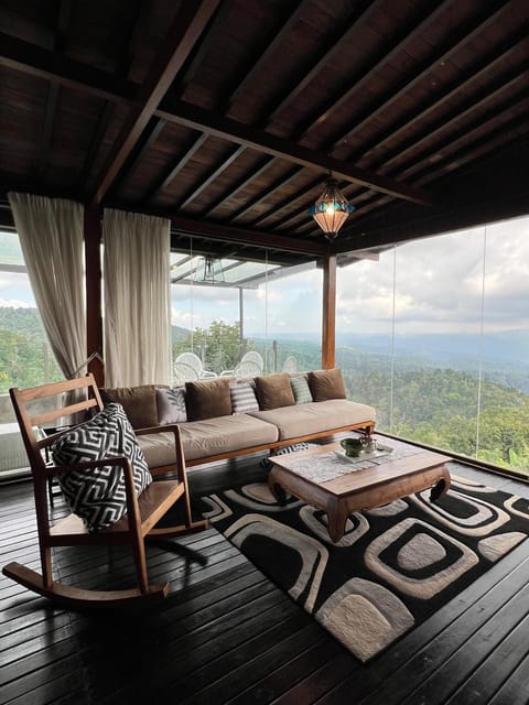 Natural landscape, Living room, Seating area, Mountain view, Sea view