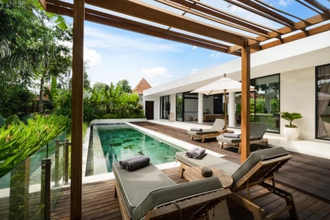 Property building, Seating area, Pool view, Swimming pool, sunbed