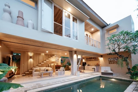 Property building, Patio, Living room, Seating area, Swimming pool, sunbed