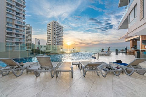 Property building, Natural landscape, View (from property/room), Balcony/Terrace, Pool view, Sea view, Swimming pool, Sunrise, Sunset, sunbed