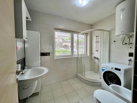 Shower, Toilet, Bathroom, Bath, bidet, towels, washing machine