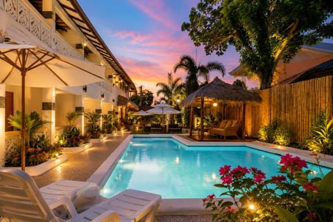 Property building, Patio, Night, People, Garden, Garden view, Pool view, Swimming pool, sunbed