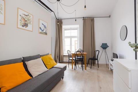 Bed, Living room, Seating area, Dining area