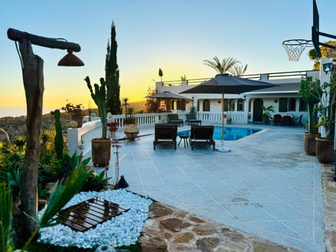 Patio, Natural landscape, Garden, Garden view, Pool view, Sea view, Swimming pool, Sunset, sunbed