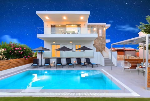 Property building, Patio, Night, Natural landscape, View (from property/room), Balcony/Terrace, Pool view, Swimming pool, sunbed