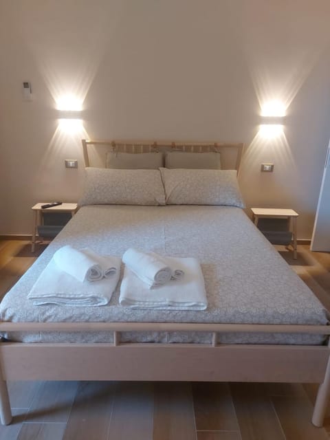 Bedroom, towels, wardrobe, air conditioner