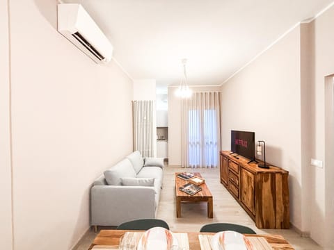 Communal lounge/ TV room, Bed, TV and multimedia, Living room, Photo of the whole room, Seating area, Evening entertainment, Bedroom, hair dresser, air conditioner