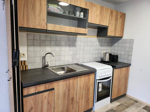 Kitchen or kitchenette, stove