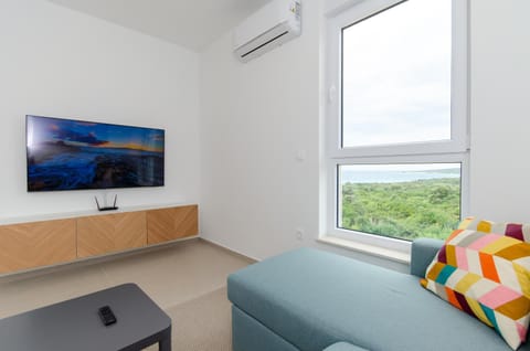 Natural landscape, TV and multimedia, Living room, Seating area, Sea view, air conditioner