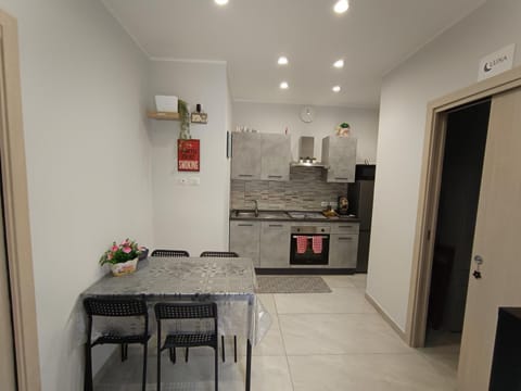 Facade/entrance, kitchen