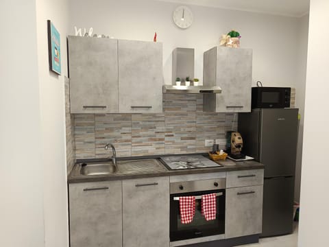 Kitchen or kitchenette, microwave, oven