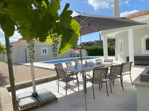 Property building, Patio, Day, View (from property/room), Dining area, Pool view, Swimming pool, sunbed
