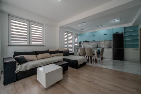 Kitchen or kitchenette, Living room, Seating area, Dining area