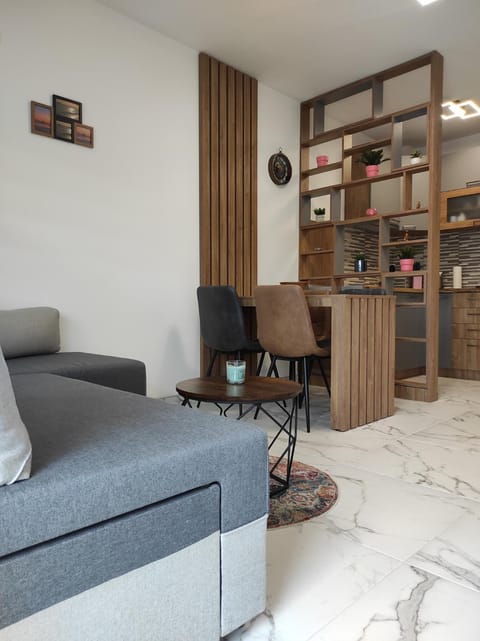 Kitchen or kitchenette, Living room, Seating area, Dining area