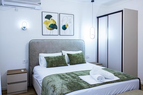 Bed, Photo of the whole room, Bedroom, towels, wardrobe, air conditioner