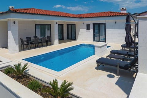 Property building, Patio, Swimming pool