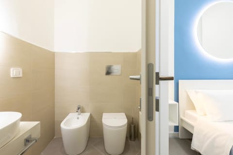 Toilet, Bed, Bathroom, Photo of the whole room, Bedroom, bidet, hair dryier, towels