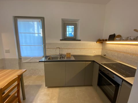 Kitchen or kitchenette, stove