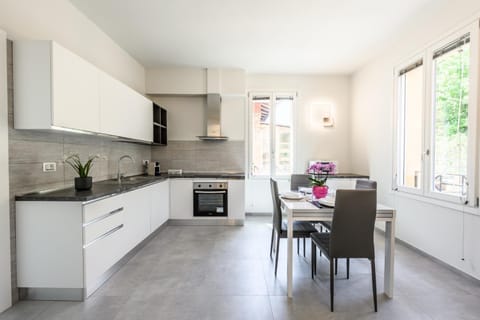 Kitchen or kitchenette, Photo of the whole room, Dining area, oven, stove