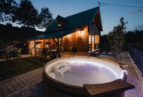 Property building, Patio, Night, Natural landscape, Hot Tub, Pool view, Swimming pool