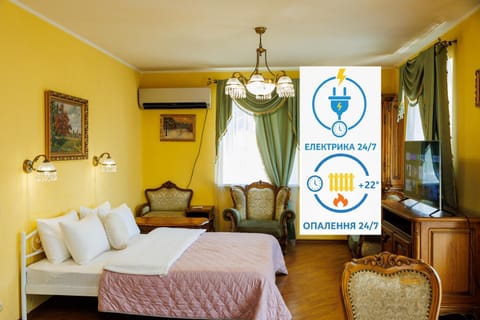 Bed, Property logo or sign, TV and multimedia, Photo of the whole room, Logo/Certificate/Sign, Bedroom, Text overlay, Certificate/Award, air conditioner, air conditioner